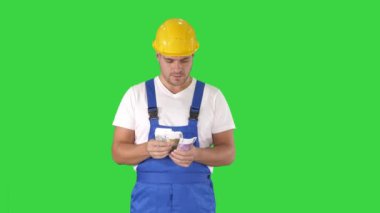 Oluşturucu yeşil ekranda duran para sayma, Chroma Key.