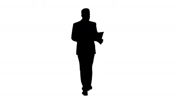 Silhouette Uomo d'affari che cammina e supervisiona il piano della casa . — Video Stock