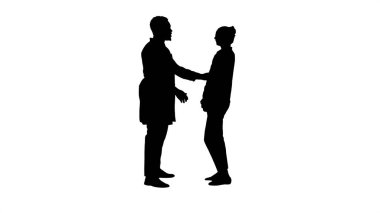 Siluet Doktor bir hastaya iyi haberler veriyor..