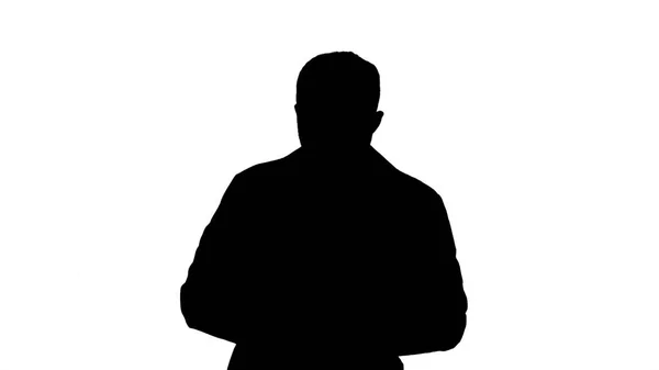 Silhouette Doctor talking on mobile phone. — Stock Photo, Image