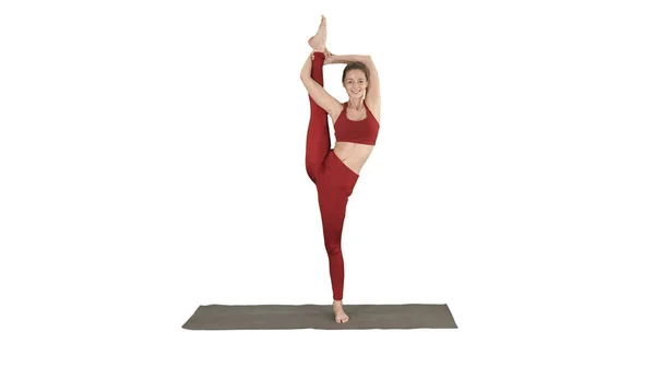 Modelo de Yoga Feminino Fazendo de pé Split Sorrindo no fundo branco. — Fotografia de Stock