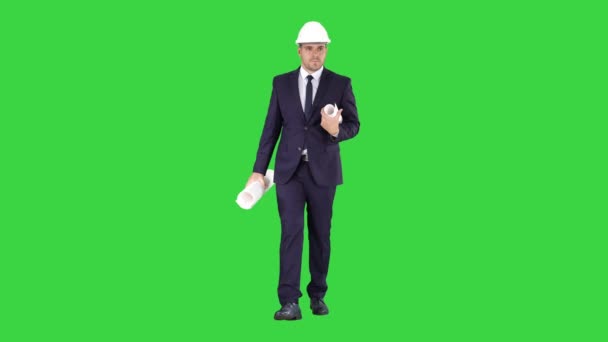 Concetto di start up, architetti, ingegnere in possesso di cianografia in ufficio o in cantiere e camminare su uno schermo verde, Chroma Key . — Video Stock