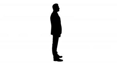 Silhouette kıdemli beyaz işadamı seyir ve nesne kontrol.