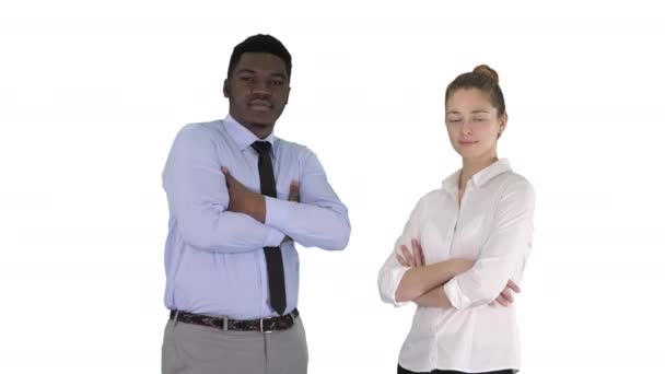 International business people standing with folded arms on white background. — Stock Video