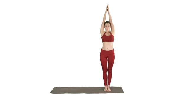 Sportos fiatal nő csinál jóga gyakorlat fehér háttér. — Stock Fotó
