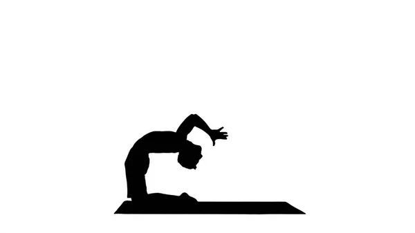 Silhouette Yogi beim Kamel-Yoga. — Stockfoto