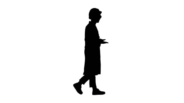 Silhouette Frau Ingenieurin Walkin und sprechen emotional. — Stockfoto