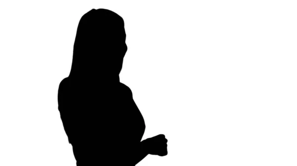 Silhouette Donna che parla al telefono. — Foto Stock