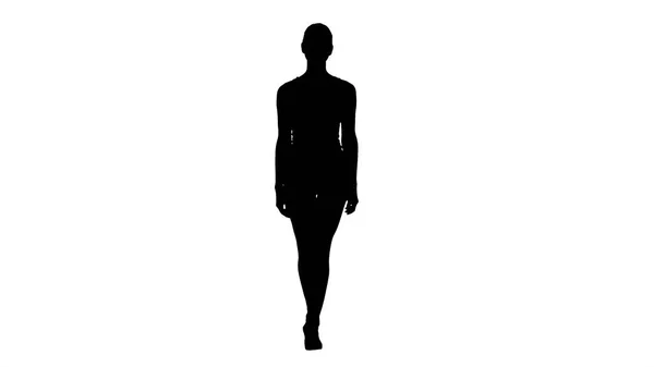 Silhouette Sporty styles woman walking in white. — Stock Photo, Image