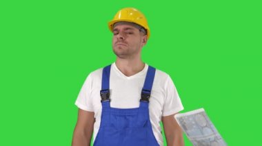 İnşaat işçisi euro iş için ödenen mutlu bir Yeşil Ekranda ödenecek, Chroma Anahtar.