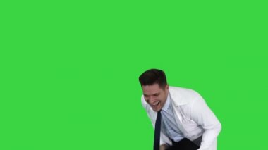 Yeşil Ekranda gülen bir dizüstü bilgisayar ile Girişimci mühendis veya doktor, Chroma Key.