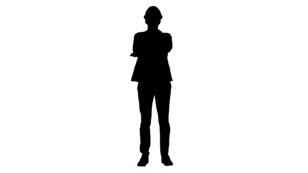 Silhouette Confident construction engineer architect young man in helmet with hands folded. — Stock Video