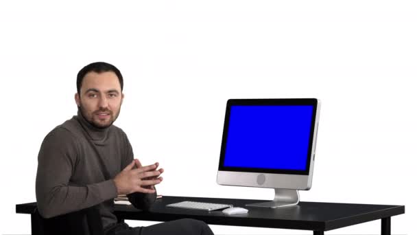 Handsome businessman looking in camera and talking, white background. Blue Screen Mock-up Display. — Stock Video