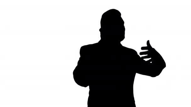 Silhouette Homme d'affaires parlant sur téléphone mobile heureux. — Video