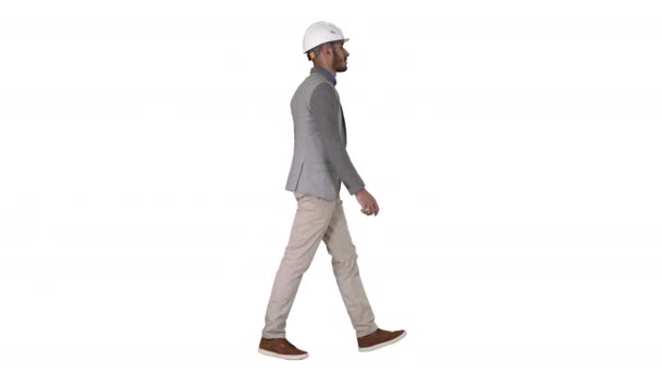 Architect in white helmet walking on white background. — Stock Video