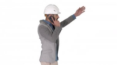 Mimar mühendisi, beyaz arka plandaki nesneleri işaret eden çalışmaların sonuçlarından şikayet eden bir telefon görüşmesi yapıyor..