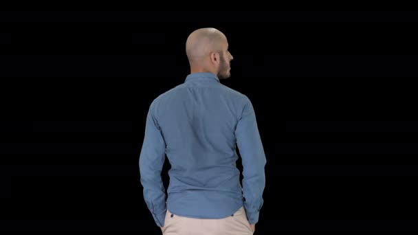 Arab in casual looking around with hands in pockets, Alpha Channel — Stock Video