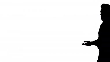 Siluet Olgun Adam cep telefonuyla konuşuyor.