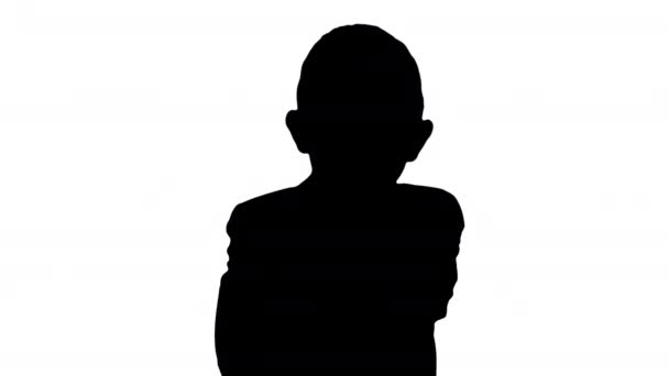 Silhouette Little boy kid crossing hands in a formal costume. — Stock Video
