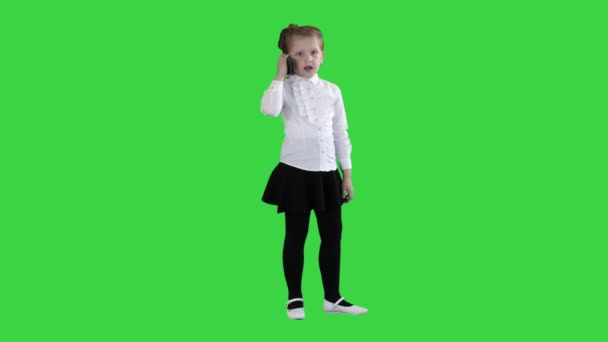 Happy girl with mobile phone Isolated on a Green Screen, Chroma Key. — Stock Video