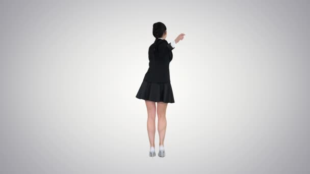 Σχολείο κορίτσι χορεύει σε ντεγκραντέ φόντο. — Αρχείο Βίντεο