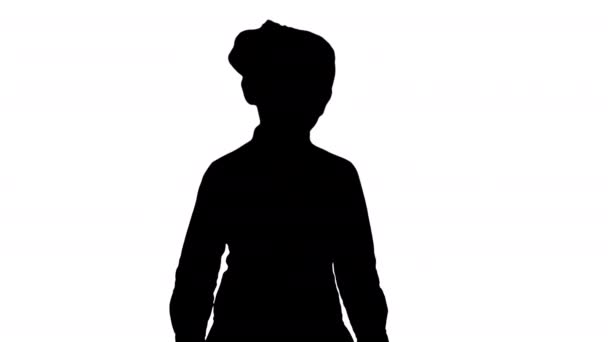 Silhouette School chica caminando y hablando con la cámara . — Vídeos de Stock
