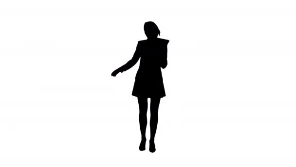 Silueta roztomilá žena v sukni tančí a používá digitální tablet. — Stock video