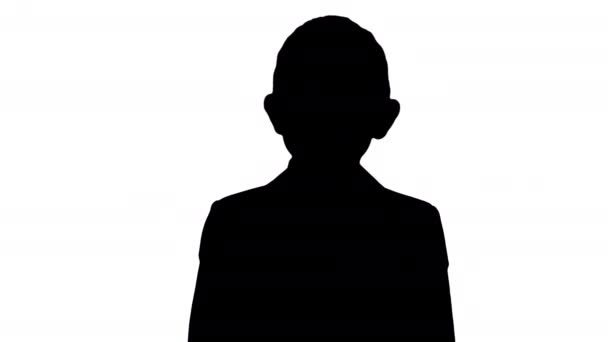 Silhouette Smiling little boy in formal clothes standing. — Stock Video