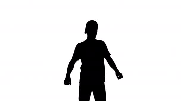 Silhouet blanke man rapper doet wat stijlvolle licht dansen. — Stockvideo