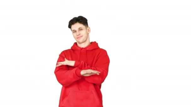 Casual man in red hoody dancing on white background. — Stock Video