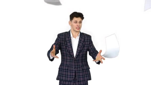 Businessman throws up documents and dances happy on white background. — Stock Video