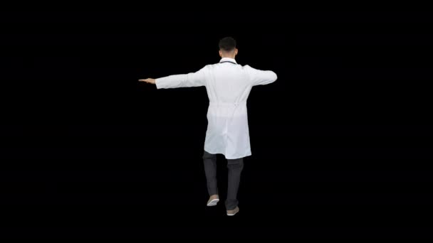 Handsome doctor man wearing medical uniform dancing, Alpha Channel — Stock Video