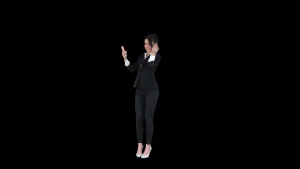 Business woman look into smart phone preening and dancing, Alpha Channel — Stock Video