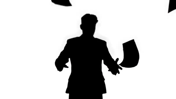 Silhouette Businessman throws up documents and dances happy. — Stock Video