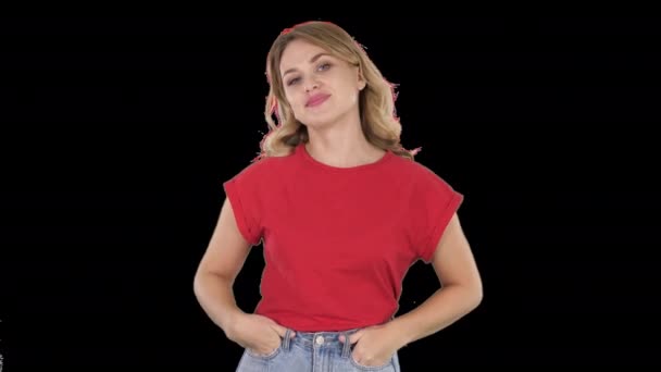 Emotional happy and positive beautiful young woman talking and walking with hands in pockets, Alpha Channel — Stock Video