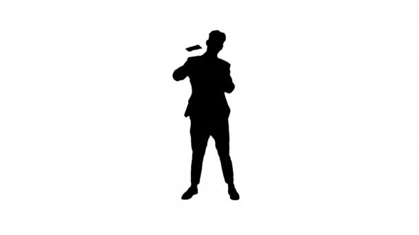 Silhouette Giovane uomo d'affari felice ballare e gettare soldi . — Video Stock