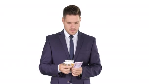 Hombre de negocios guapo contando euros sobre fondo blanco. — Vídeos de Stock