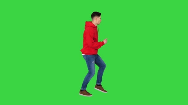 Young hip-hop man break dancing Top break dance on a Green Screen, Chroma Key. — Stock Video