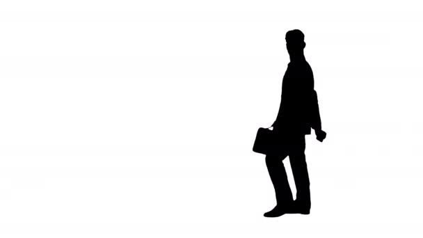 Silhouette Young business man walking and taking a selfie. — Stock Video