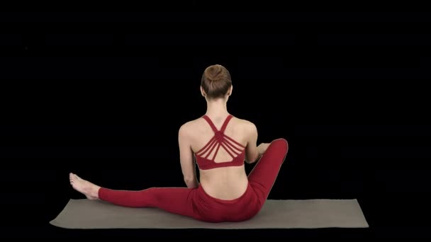 Mulher fazendo uma pose de lótus, Canal Alfa — Vídeo de Stock
