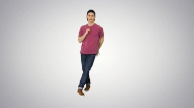 Gradyan arka planda dans eden bir şapkalı hip-hop adamı.