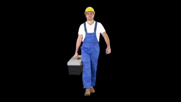 Chodzący pracownik budowlany z skrzynką narzędziową, Alpha Channel — Wideo stockowe