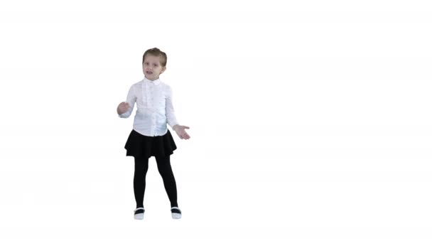 Girl singing a song in a cute way on white background. — Stock Video