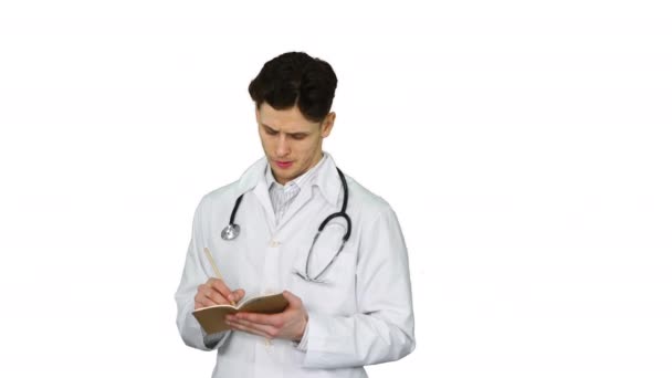 Expressive young male doctor with creative idea starts dancing on white background. — Stock Video