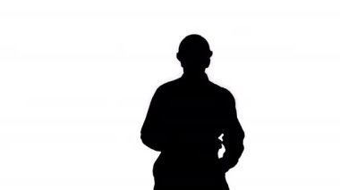 Kask dansı siluetinşaat işçisi.