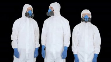 Koruyucu giysili bilim adamları ya da doktorlar el ele tutuşmaya hazır, Alpha Channel.