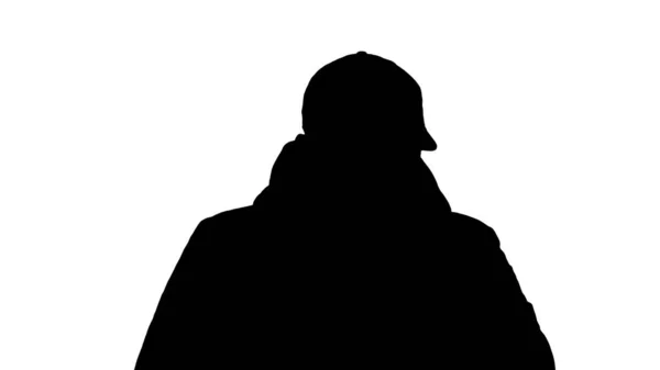 Silhouette Man in winter outfit walking and coughing. — Stock Photo, Image