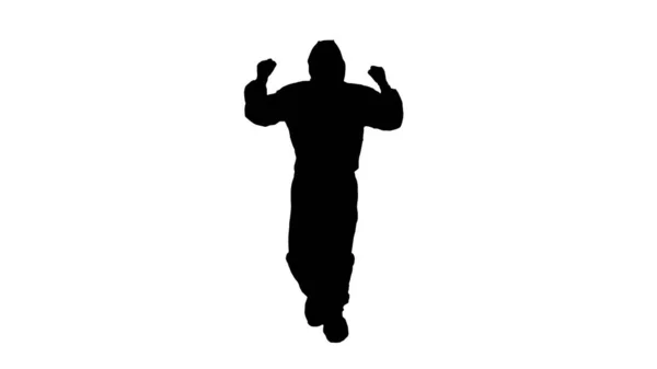 Silhouette Man en traje de hazamat caminando y bailando. Concepto Covid-19 . — Foto de Stock