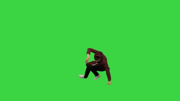 穿着红色制服的男厨师在绿色屏幕上跳着绿色背景的霹雳舞。. — 图库视频影像