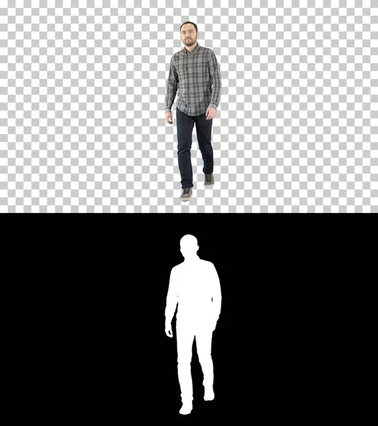 Usmívající se mladý muž jde, alfa kanál — Stock fotografie